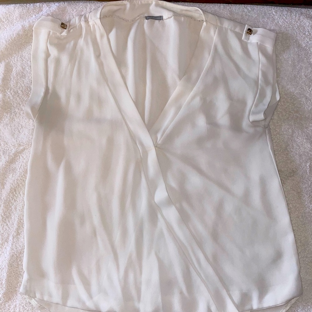 White deep V-neck chiffon top. Business attire.